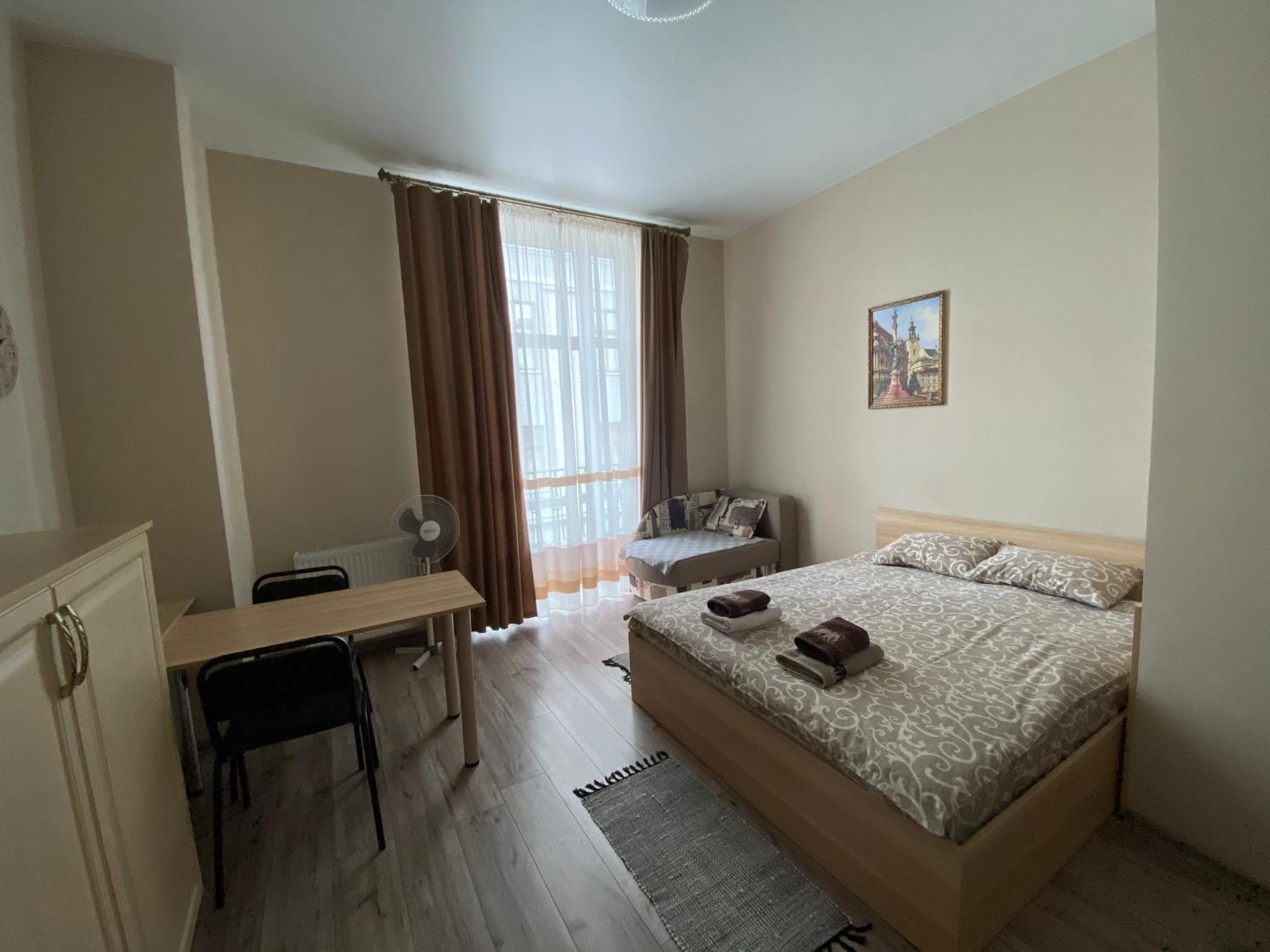 The Heart Of Lviv Apartments - Лвив Стая снимка